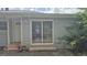 The backyard features a sliding glass door and a back entrance door at 250 Jonesboro Rd, Jonesboro, GA 30236