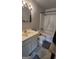 Bathroom featuring a sink, toilet, shower and tub combo, and grey floor at 250 Jonesboro Rd, Jonesboro, GA 30236