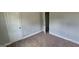Bedroom featuring neutral carpet, gray walls and white baseboards at 250 Jonesboro Rd, Jonesboro, GA 30236