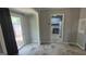 Bright dining area with access to the kitchen and a sliding glass door leading to outdoor at 250 Jonesboro Rd, Jonesboro, GA 30236