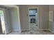 Bright dining area with access to the kitchen and a sliding glass door leading to outdoor at 250 Jonesboro Rd, Jonesboro, GA 30236