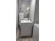 A laundry room features a dryer, washing machine, and hot water heater at 250 Jonesboro Rd, Jonesboro, GA 30236