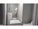 A laundry room features a washing machine, dryer, and hot water heater at 250 Jonesboro Rd, Jonesboro, GA 30236