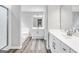 Modern bathroom with double sink vanity and spacious countertops with a walk in shower and soaking tub at 980 Charter Club, Lawrenceville, GA 30043