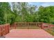 Back deck overlooking the backyard and trees at 980 Charter Club, Lawrenceville, GA 30043