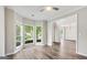 Bright living room featuring large bay windows and an open floor plan at 980 Charter Club, Lawrenceville, GA 30043