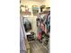 Walk-in closet with ample shelving and hanging space for optimal organization at 223 Overland Trl, Mcdonough, GA 30252