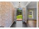 Elegant foyer featuring decorative wallpaper, slate tile floor and view to front yard at 115 Fernway Dr, Fayetteville, GA 30214