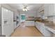 Bright eat-in kitchen with modern appliances and an open layout at 115 Fernway Dr, Fayetteville, GA 30214
