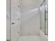 The bathroom features tile floors and a bathtub with glass doors at 332 Aster Ridge Trl, Peachtree City, GA 30269