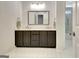 The bathroom features double sinks and drawers for storage at 332 Aster Ridge Trl, Peachtree City, GA 30269