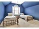 Blue bedroom with twin beds and vaulted ceiling at 332 Aster Ridge Trl, Peachtree City, GA 30269