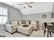 This room features a plush couch and a desk at 332 Aster Ridge Trl, Peachtree City, GA 30269