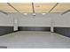 Clean and spacious garage with a professionally coated floor at 332 Aster Ridge Trl, Peachtree City, GA 30269