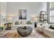 Comfortable living room with hardwood floors, cozy seating, and elegant decor at 332 Aster Ridge Trl, Peachtree City, GA 30269
