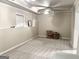 Carpeted bonus room featuring neutral wall color and bright natural light at 116 Cardell Farms Rd, Locust Grove, GA 30248