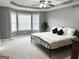 Calm main bedroom with lots of natural light and neutral color scheme at 116 Cardell Farms Rd, Locust Grove, GA 30248