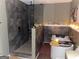 Stunning bathroom with standalone tub, luxurious shower, and decorative shelves and lighting at 6131 Sparkling Cove Ln, Buford, GA 30518