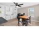 Spacious bonus room featuring built-in bookshelves with ample storage space, perfect for a home office at 6131 Sparkling Cove Ln, Buford, GA 30518