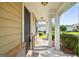 Inviting front porch with stately columns at 6131 Sparkling Cove Ln, Buford, GA 30518