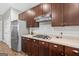 Updated kitchen featuring stainless steel appliances, a gas range, and stylish cabinetry at 6131 Sparkling Cove Ln, Buford, GA 30518