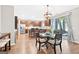 Bright, open kitchen featuring stainless steel appliances and a dining area with sliding doors at 6131 Sparkling Cove Ln, Buford, GA 30518