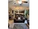 Cozy living room with open access to the kitchen and dining area at 6131 Sparkling Cove Ln, Buford, GA 30518