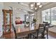 Open dining area with wood table, perfect for gatherings and entertaining at 110 Sunflower St, Tyrone, GA 30290