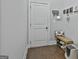 Functional entryway with storage bench, key rack and hooks for organizing at 110 Sunflower St, Tyrone, GA 30290