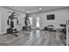 Home gym featuring workout equipment and laminate flooring at 110 Sunflower St, Tyrone, GA 30290