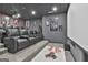 This home theater features tiered seating with plush leather recliners, projector, and Star Wars themed decor at 110 Sunflower St, Tyrone, GA 30290