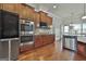 Gourmet kitchen featuring stainless steel appliances, gas cooktop, and stylish cabinetry at 110 Sunflower St, Tyrone, GA 30290