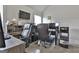 Brightly lit office with two desks, two leather office chairs, and modern computer hardware at 110 Sunflower St, Tyrone, GA 30290
