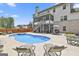 A beautiful backyard pool and spa are surrounded by a large patio, great for entertaining at 110 Sunflower St, Tyrone, GA 30290