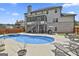 A spacious backyard pool and patio are accompanied by a screened-in porch at 110 Sunflower St, Tyrone, GA 30290