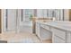 Bright bathroom with double vanity, separate shower, and a large soaking tub at 747 Gardenside Cir, Marietta, GA 30067
