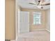 Comfortable bedroom featuring carpeting, a window with blinds, and a ceiling fan at 747 Gardenside Cir, Marietta, GA 30067