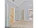 Spacious bedroom featuring vaulted ceilings and access to a closet and bathroom at 747 Gardenside Cir, Marietta, GA 30067