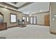 Spacious basement featuring a fireplace and sliding glass doors to the outside at 3530 Highway 81 W, Hampton, GA 30228