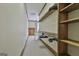 Walk-in closet features shelving and storage throughout at 3530 Highway 81 W, Hampton, GA 30228
