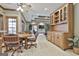 Inviting dining area with tile floors and a wooden table with leather chairs, perfect for casual meals and gatherings at 3530 Highway 81 W, Hampton, GA 30228