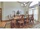 Formal dining room featuring a large table, chandelier, and lots of natural light at 3530 Highway 81 W, Hampton, GA 30228