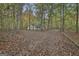 A glimpse of a house nestled among the trees at 3530 Highway 81 W, Hampton, GA 30228
