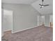 Spacious bedroom with plush carpeting, a ceiling fan, and multiple closets for ample storage at 7770 Hana Court Ct, Jonesboro, GA 30236