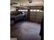 Spacious garage with a parked blue car and open garage doors at 5840 Butner Rd, South Fulton, GA 30349