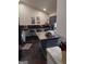 Kitchen featuring counter seating and an island, offering a modern and functional cooking space at 5840 Butner Rd, South Fulton, GA 30349
