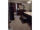 The main bedroom showcases a dresser, mirror, and bed, providing a comfortable retreat within the home at 5840 Butner Rd, South Fulton, GA 30349
