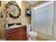 Stylish bathroom with vanity, decorative mirror, and shower showcasing modern fixtures and finishes at 3245 Bywater Trl, Roswell, GA 30075