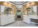 Bright bathroom with dual sinks, mirrors, and white tile flooring at 3245 Bywater Trl, Roswell, GA 30075