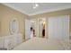 A lovely bedroom with a dresser, mirror, and closet space provides ample storage at 3245 Bywater Trl, Roswell, GA 30075